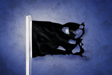 Torn black flag flying against grunge backgroundの写真素材