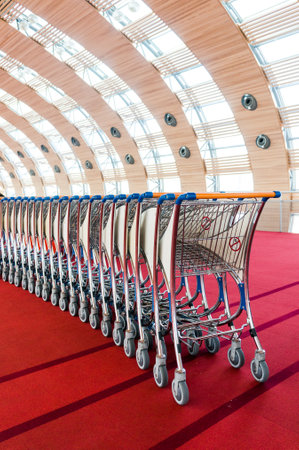 luggage carts at modern airportの写真素材