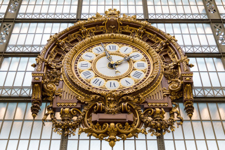 Paris, France, March 28 2017: Golden clock of the museum DOrsay.The Musee dOrsay is a museum in Paris, on the left bank of the Seineのeditorial素材