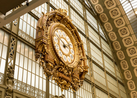 Paris, France, March 31 2017: Golden clock of the museum DOrsay.The Musee dOrsay is a museum in...
