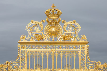 The golden gate of the Palace of Versailles, or Chateau de Versailles, or simply Versailles, in Franceの写真素材