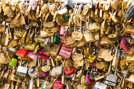 FRANCE, PARIS - April 01, 2017: Pont des arts - bridge across Seine river crammed with lovers padlocks on April 01, 2017のeditorial素材