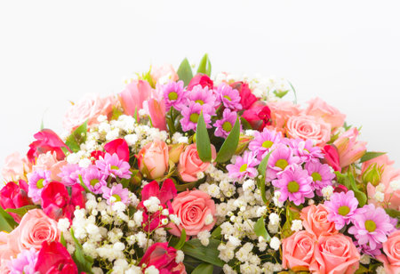 beautiful bouquet of spring flowers on whiteの写真素材