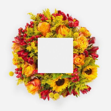 Creative layout made of flowers and leaves with paper card note. Flat layの写真素材