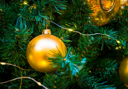 Christmas decorations on the branches of fir treeの写真素材