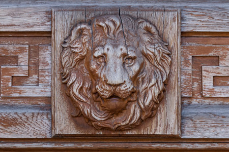Lion head relief on the facadeの写真素材