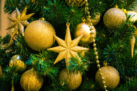 Christmas decorations on the branches of fir treeの写真素材