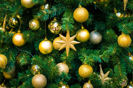 Christmas decorations on the branches of fir treeの写真素材