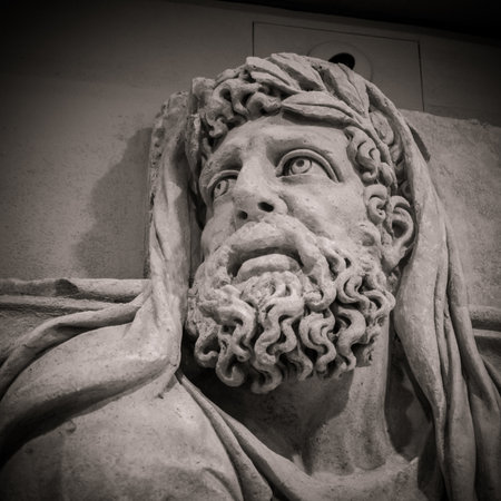 Head and shoulders detail of the ancient sculpture