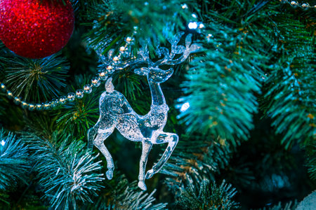 Christmas decorations on the branches of fir treeの写真素材