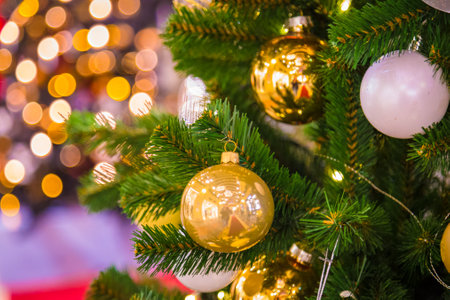 Christmas decorations on the branches of fir treeの写真素材