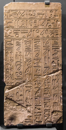 ancient stone relief at Chnum temple in Egypt