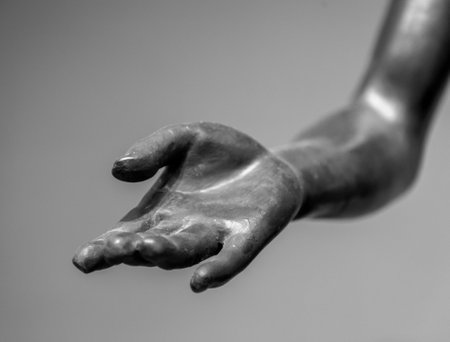 stone statue detail of human handの写真素材