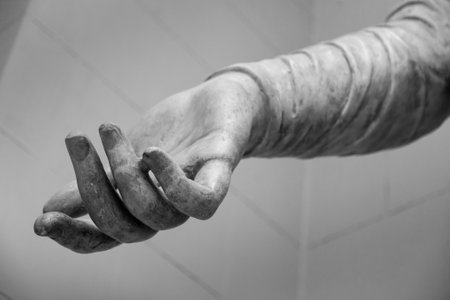 stone statue detail of human handの写真素材