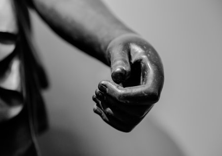 stone statue detail of human hand