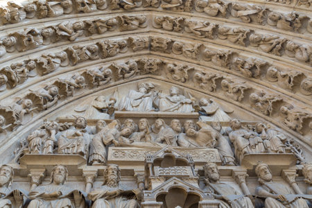 Paris, France - famous Notre Dame cathedral facade saint statues.の写真素材