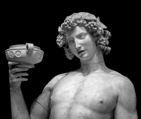 Dionysus Bacchus Wine statue portrait on blackの写真素材