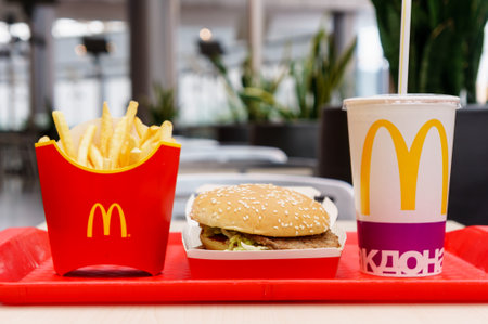Moscow, Russia, March 15 2018: McDonalds Big Mac hamburger menu, French Fries and Coca Cola