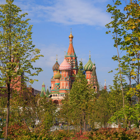 Green trees and grass on the background of the Moscow Kremlin and the red square in the park Zaryadyeの写真素材