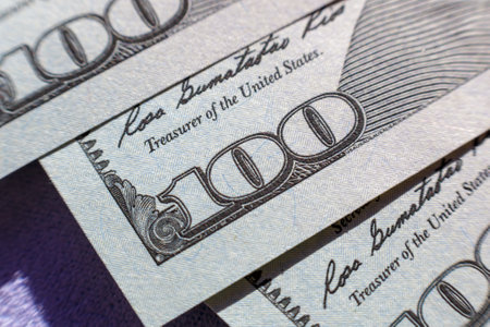 Close-up view on one hundred dollar bill. Macro view on one hundred dollar banknote