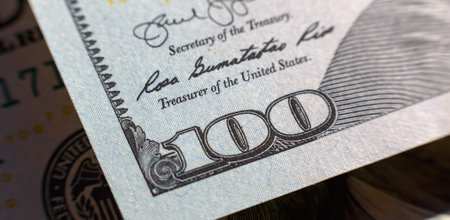 Benjamin Franklin face on us one hundred dollar bill macro isolated, united states money closeup
