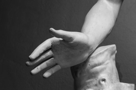 stone statue detail of human handの写真素材