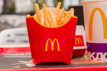 Moscow, Russia, March 15 2018: McDonalds, French Fries at red trayのeditorial素材