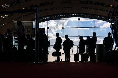 Paris, France, April 1, 2017: Silhouettes of people waiting for airplane departureのeditorial素材