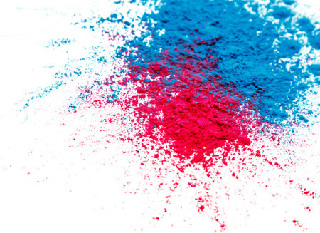 Abstract colorful Happy Holi background. Color vibrant powder isolated on white. Dust colored splash texture. Flat lay holi paint decorationの写真素材