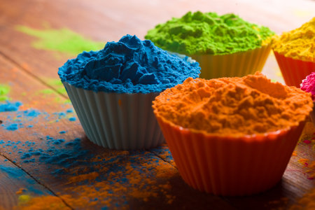 Holi color powder. Organic Gulal colours in bowl for Holi festival, Hindu tradition festiveの写真素材