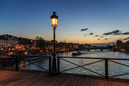 Pont des arts street lamp at night. Paris seine bridge with lantern. Morning river viewの素材 [FY310118048980]