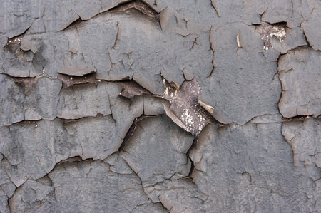 Old cracked paint on the concrete wall. Peeling paint on wall texture. Pattern of rustic blue grunge materialの写真素材