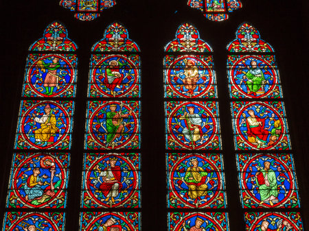 Paris, France, March 27, 2017: Stained glass window at Notre Dame cathedral. Notre Dame church is one of the top tourist attractions in Paris. Inside the old Gothic landmark of Parisのeditorial素材