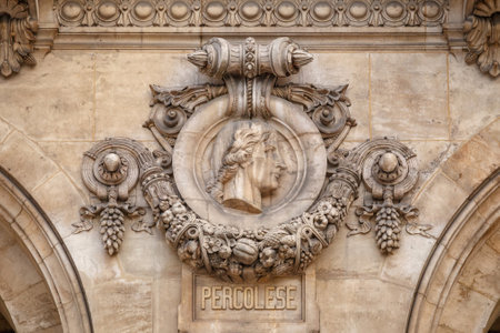 Paris, France, March 31, 2017: Architectural details of Opera National de Paris. Percolese Facade sculpture. Grand Opera is famous neo-baroque building in Paris, France - UNESCO World Heritage Siteのeditorial素材