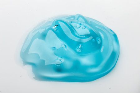 Cream gel transparent cosmetic sample texture with bubbles isolated on white background. Cosmetic cream transparent gel serum texture with micro bubble on white background beauty conceptの写真素材