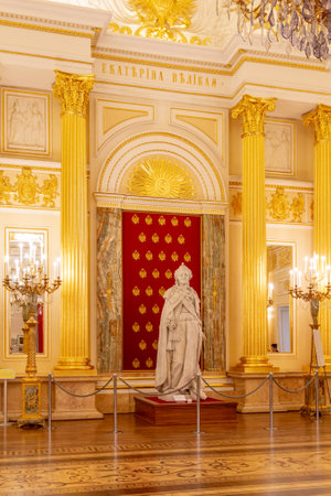 Moscow, Russia, 23 October 2019: Statue of Empress Catherine the Great in golden hall of Great Tsaritsyn Palace in museum reserve Tsaritsyno. Russian palace white and golden interiorのeditorial素材