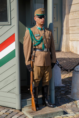 Budapest, Hungary, March 22 2018: Armed presidential guard on the Buda Hill near the residence of the president of Hungary. Guard of honor near the Presidential Palace - the national symbol of Budapestのeditorial素材