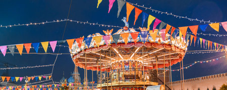 Moscow, Russia, 05 December 2017: Christmas in Moscow. Bright Christmas carousel in the capital of Russia. Christmas market on red square. Kremlin. St. Basilのeditorial素材