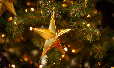 Christmas tree with gold bauble ornaments. Decorated Christmas tree closeup. Balls and illuminated...