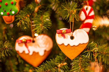 Decorated Christmas with gingerbread hanging on christmas tree, Holiday background, Merry Christmas...