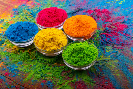 Holi color powder. Organic Gulal colours in bowl for Holi festival, Hindu tradition festive. Bright vibrant pigment closeupの写真素材
