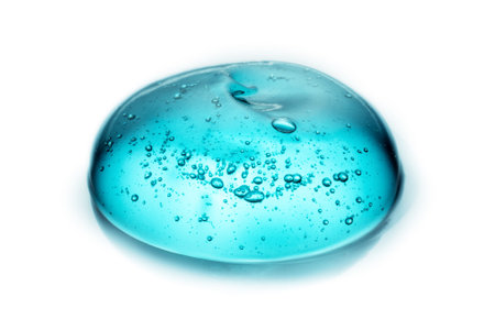 Cosmetic Cream Gel Texture Isolated On White Background. Close Up Of Green Transparent Drop Of Skin Care Product. High Qualityの写真素材