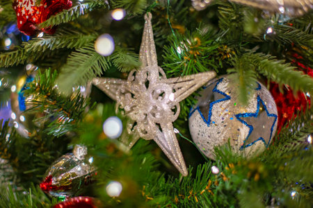 Christmas background with decorative star, fir branches and pine cones