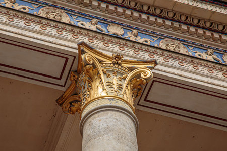 Top part of pillar, Greek-style columns with golden topの写真素材