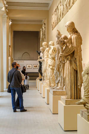 Moscow, Russia - January 26, 2021: People wearing protection mask in Pushkin Museum of Fine Arts is largest museum of Europe art in Moscow. Greek hallのeditorial素材