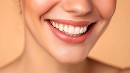 Beautiful female smile after teeth whitening procedure. Dental care. Dentistry concept.の素材