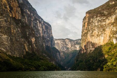National park of Sumidero canyon as one of the must see places in mexican state Chiapas, high walls of huge canynon along river Grijalvaの写真素材