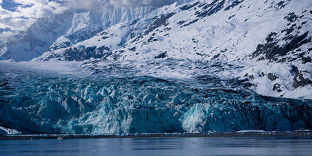 Mendenhall Glacier reveals stunning icebergs against a mountain backdrop.の写真素材