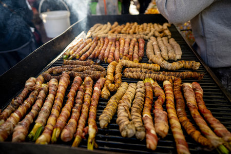 Freshly grilled Italian food served at a busy outdoor market eventの写真素材