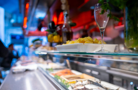 Colorful spring atmosphere in St. Josep Market with delicious dishes displayed.の写真素材